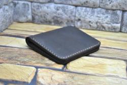 Коричневий невеликий гаманець зі шкіри